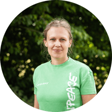 Foto von Anne Hamester in grünem Greenpeace-Shirt